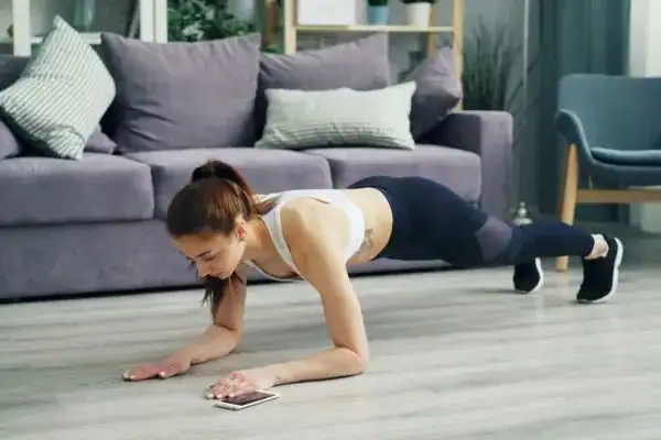woman doing exercise to help build her pelvic floor health UK