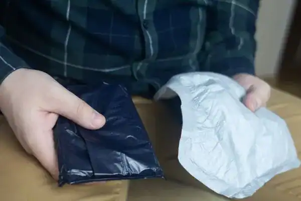 image of man holding stool incontinence UK products